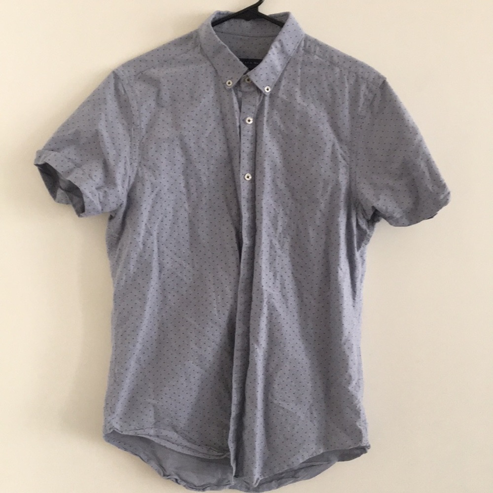 Blue short sleeve button up, dark blue polka dots